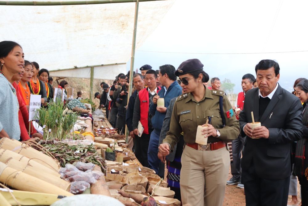 Dr Pritpal Kaur Patra, SP Noklak inspecting the seed diversity display at the Biodiversity Festival at Pathso Nokeng. (Photo Courtesy: NEN)